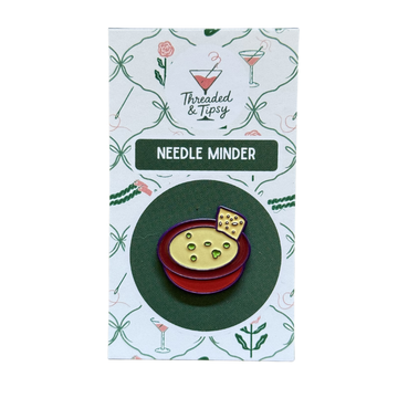 Queso Needle Minder